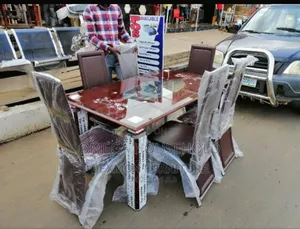 6 Seater Padded Dining Glass Table Set.