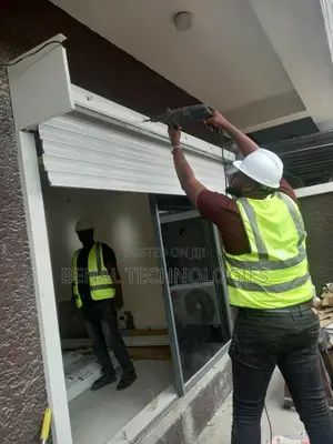 Garage Doors With Electric Roller Mechanisms