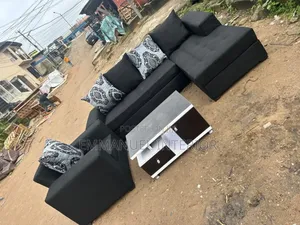 A Standard Living Room Sofa With Centre Table