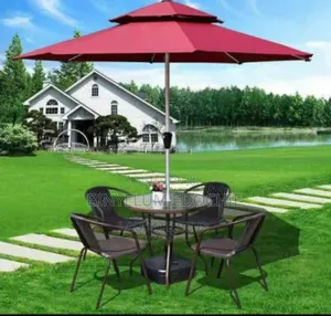 Fancy Umbrella With Chairs and Tables