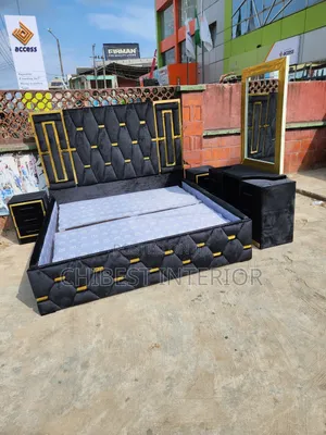 Black Upholstery Bed With Padded Sides Drawers and Dresser