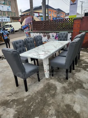 Standard Dining Set, With 8 Leather Chairs.