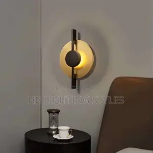 Postmodern Luxury Iron Art Golden Black Metal LED Wall Lamp