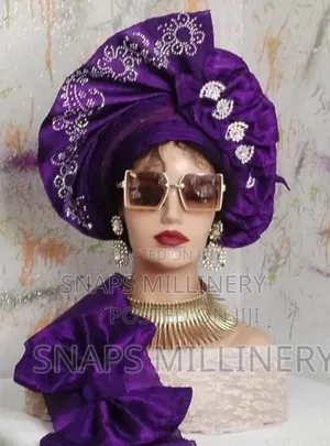 Sharp Purple Asoke Auto Gele. Well Stoned.