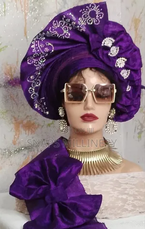 Sharp Purple Asoke Auto Gele. Well Stoned.