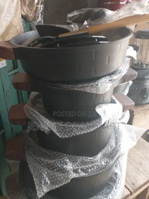 Granite Pot With Fry Pan and Spoons
