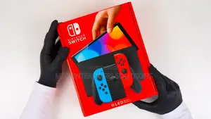 Nintendo Switch Console (OLED Model) - Neon Blue/Neon Red