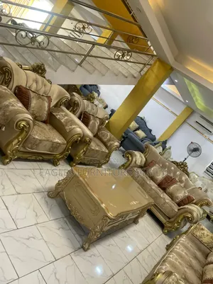 A Set of 7 Seaters Golden Chair and Table