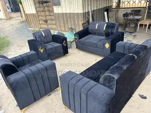 A Complete Black Set of Sofa