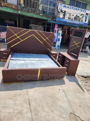 Queen Size Bed With Dressing Mirror and Side Drawers.