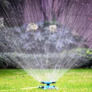 Automatic Garden Sprinklers Watering Grass