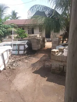 Half 40ft by 90ft Egan Agric Road Fenced