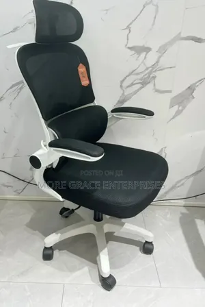 Office Chair Swivel With White Back and Headrest.
