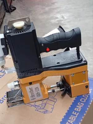 Electric Sewing Machine .