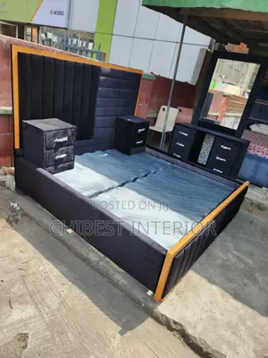 Black Padded Queen Size Bed With Cupboards and Dresser
