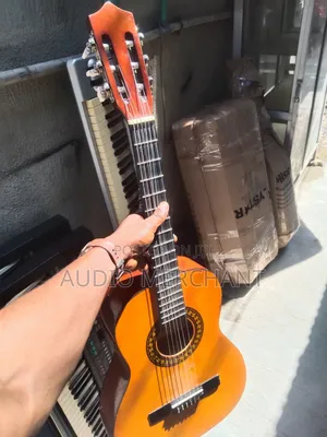 Yamaha Kids Guitar in Brown and Red Colour