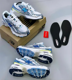 740 Nb Blue and White Sneakers
