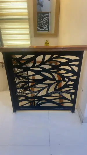 Wrought Iron Handrail With a Mahogany Wood