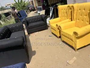A Standard Chesterfield With Accent Chair