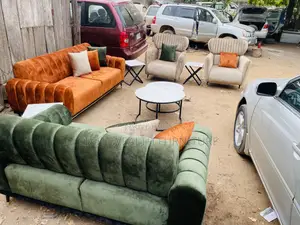 Channel Back Sofa With Center Table and Stools
