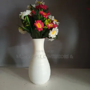 Artificial Flowers With White Vase