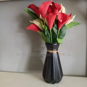 Artificial Flowers With Black Vase