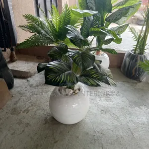 White Vase With Big Artificial Flowers