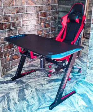 Imported Game Table and Swivel Game Chair With Lead Light.
