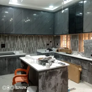 Kitchen Cabinet With White Carrara Marble Countertop
