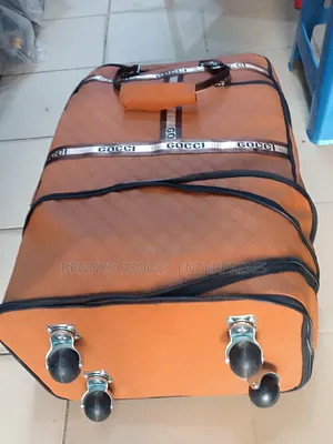 Gucci Designed Leather Travelling Duffel Bag With Trolleys