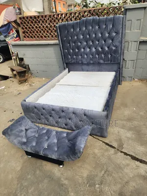4.5by6 Grey Colour Bed Frame With Its Footrest.
