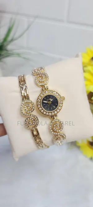 Female Guess Wristwatch and Bracelet Combo