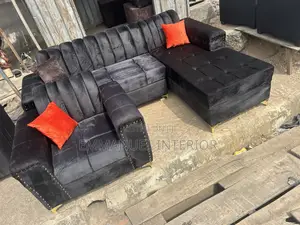 A Living Room Couch With Throw Pillow