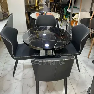 Round Marble Dining Table With Four Chairs.
