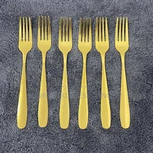 Golden and Sliver Eating Spoon and Fork