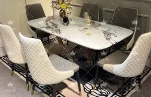 Quality and Imported Marble Top Dining Table by 6 Chairs