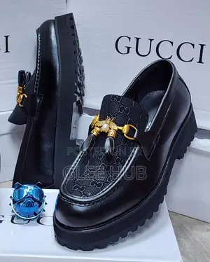 Gucci Logo-Patterned Loafers