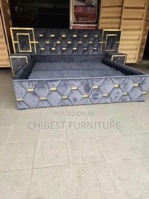 Padded Six by Six Bed With Three Step Drawers.