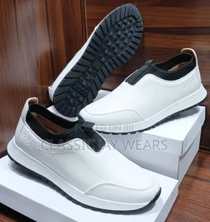 Pure White HUGO BOSS Sneakers Available in Store