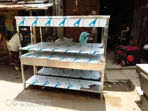 5 Ft. Stainless Steel Padded Work Table With Under Shelves