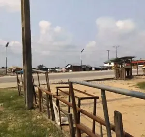 100 by 50 Commercial Land Along Ughelli Warri Road