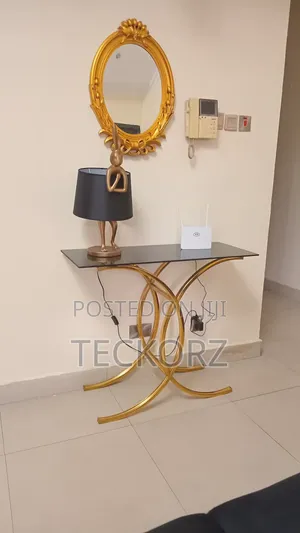 Channel Golden Stainless Steel Console Table