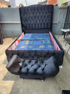 Black Padded 4.5by6 Bed With Footrest