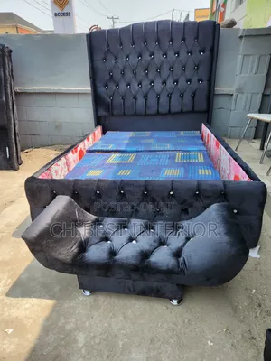 A Bed Frame With Its Footrest.