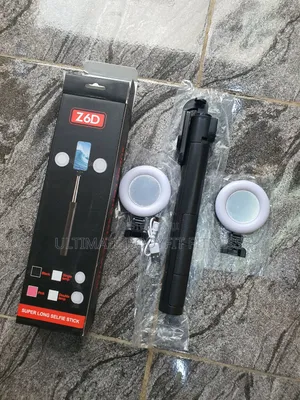 Brand New 2 In 1 Selfie Stick Tripod With Built-in Wireless