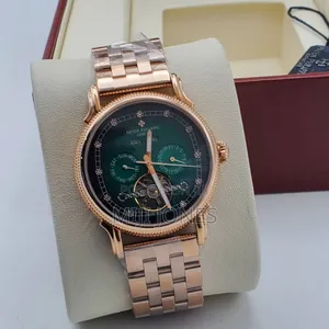 "Patek Philippe Rose Gold, Green Dial, Perpetual Calendar"