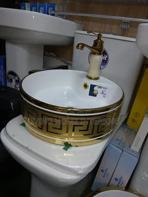 Golden and White Countertop Basin