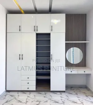Wardrobe Closet With All the Interior Beside the Wardrobe