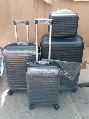 Black Set of 4 FL Unbreakable Elastic Rubber Travel Luggages