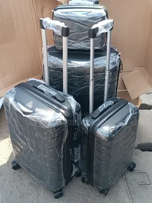 Range Set of 4 FL Unbreakable Elastic Rubber Travel Luggages